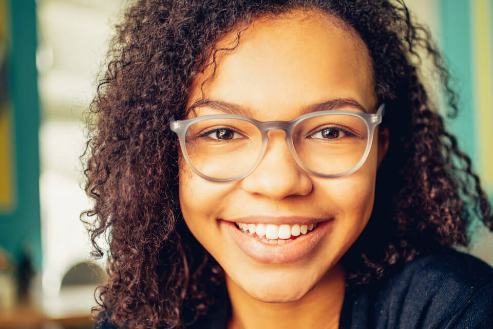 cheerful girl wearing glasses