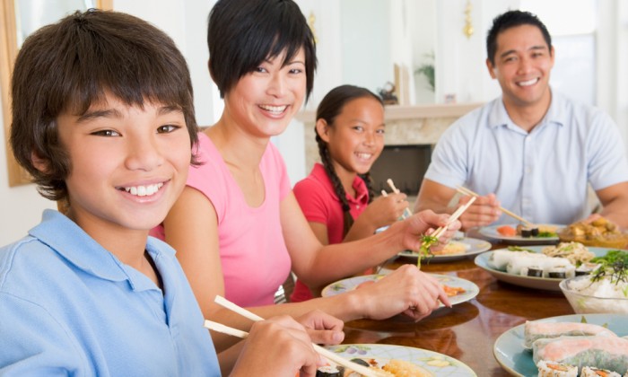 Family Eating A meal,mealtime Together