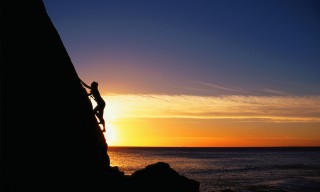 Rock Climber Silhouette at Sunset