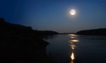 night landscape with moon and moonbeam in river