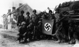 US Infantrymen with Captured Nazi Flag
