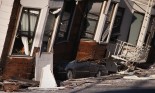 Car under collapsed row houses, San Francisco, California, USA