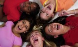 Teenage girls laughing