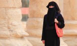 Veiled Muslim woman walking