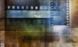 Sepia-, blue-, and green-toned grungy film negatives overlapping background