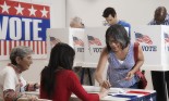 Voters voting in polling place