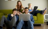 Group of teens on laptop and tablet