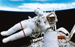 Astronaut Repairing a Satellite in Space