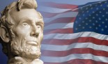 Lincoln head with United States flag in the background