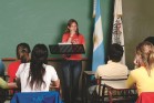 Girl giving speech in class