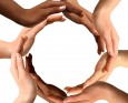 Multiracial human hands making a circle