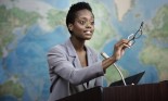 African American businesswoman talking at podium