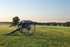 Sunset view of the old cannons in a line at Manassas Civil War battlefield, where the Bull Run battle was fought.