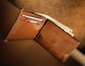 Brown leather wallet, open