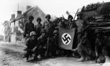 US Infantrymen with Captured Nazi Flag