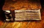 Old shabby book in leather cover