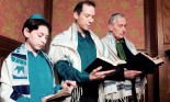 Three generations reading from the Torah