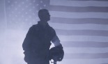 Silhouette of Air Force pilot in front of American flag