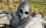 Viking helmet in field