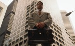 Portrait of a Businessman in Front of Skyscraper
