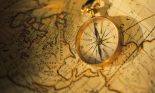Compass and antique map
