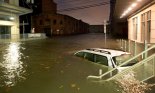 Flooded Car on an Urban Street