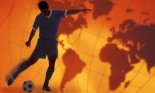 Soccer player with world map in the background