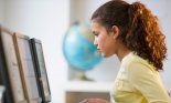 girl sitting at computer