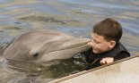 Boy with Bottle-Nose Dolphin