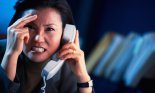 Frustrated Businesswoman on the Phone