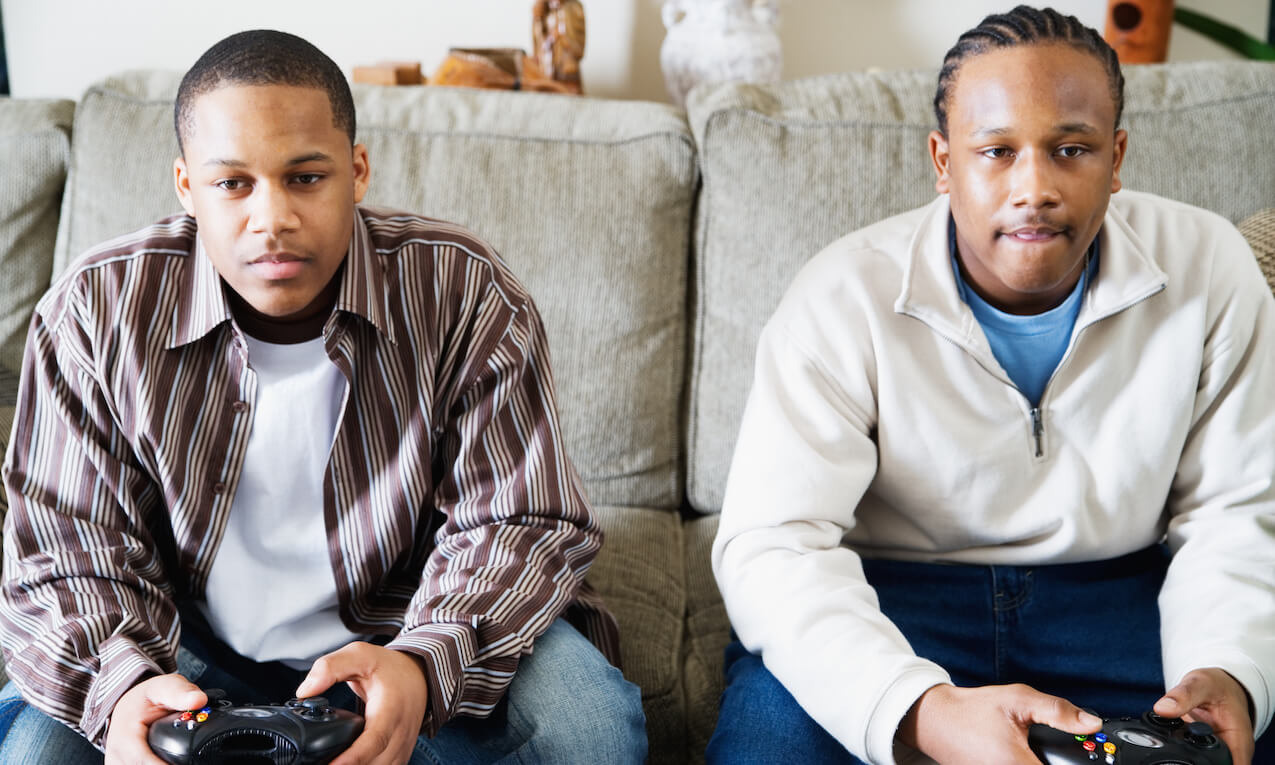 Two boys playing video game