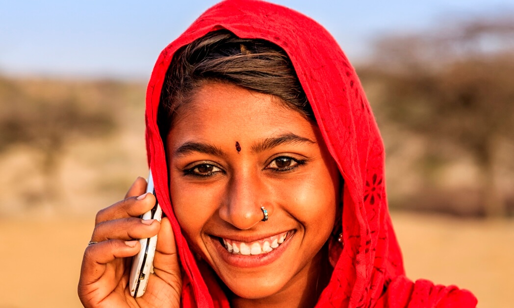Indian teenage girl on phone