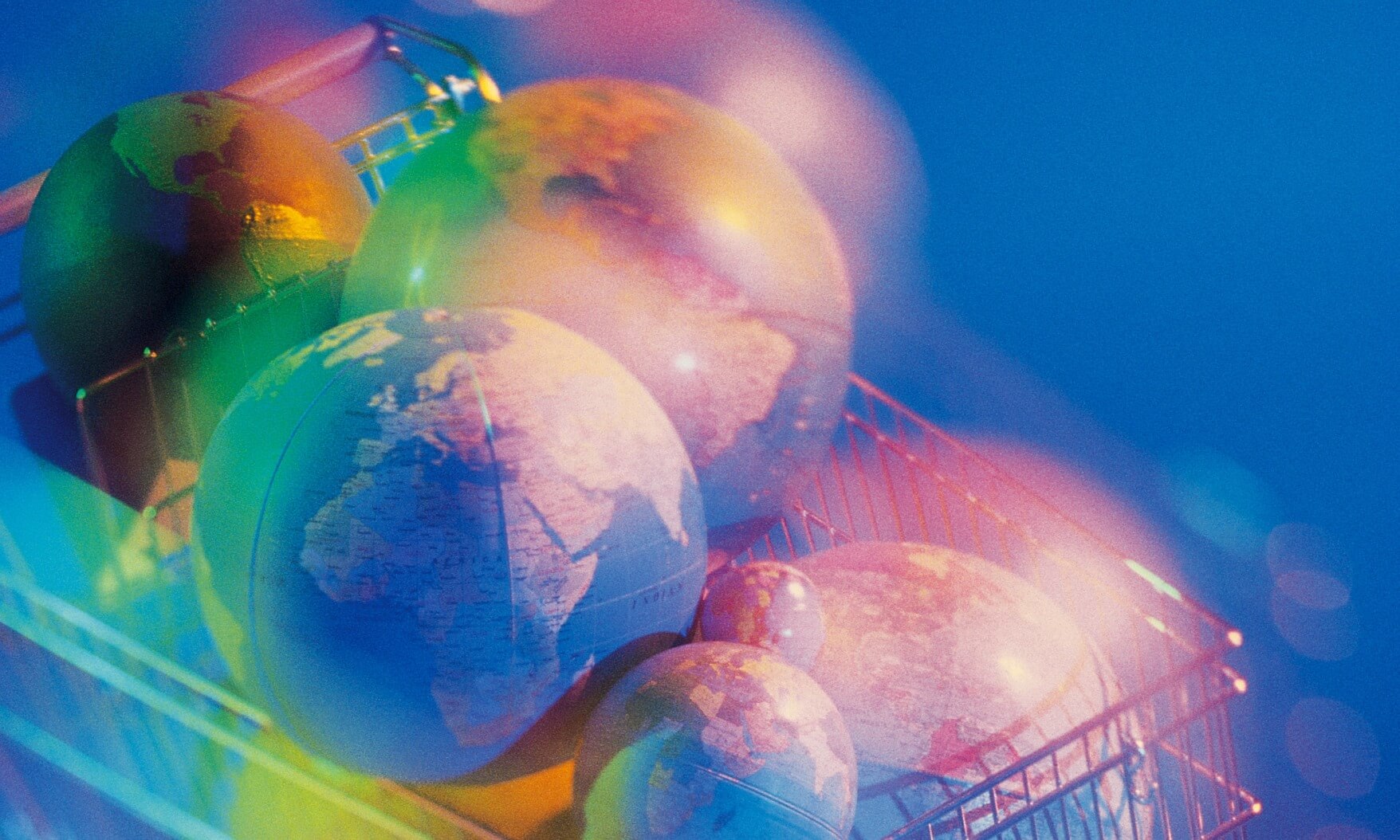 Shopping cart filled with many globes