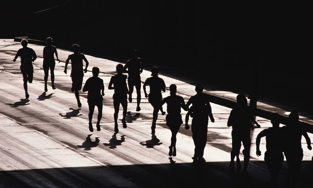 Silhouette of People Running a Marathon