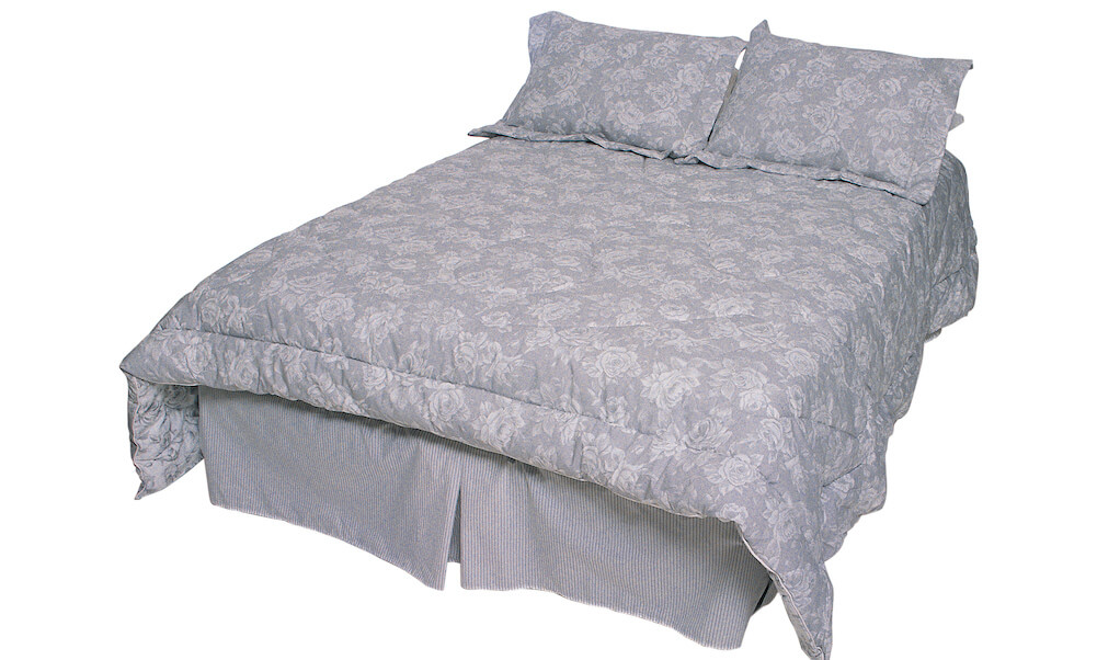 Bed with gray comforter