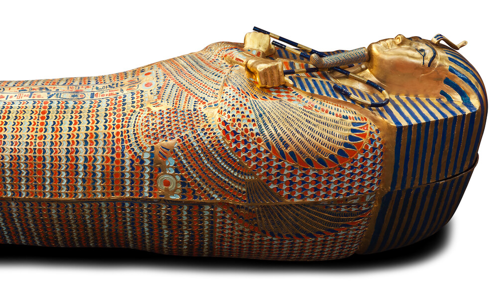 Modern copy of Tutankhamen's wooden sarcophagus isolated with clipping path