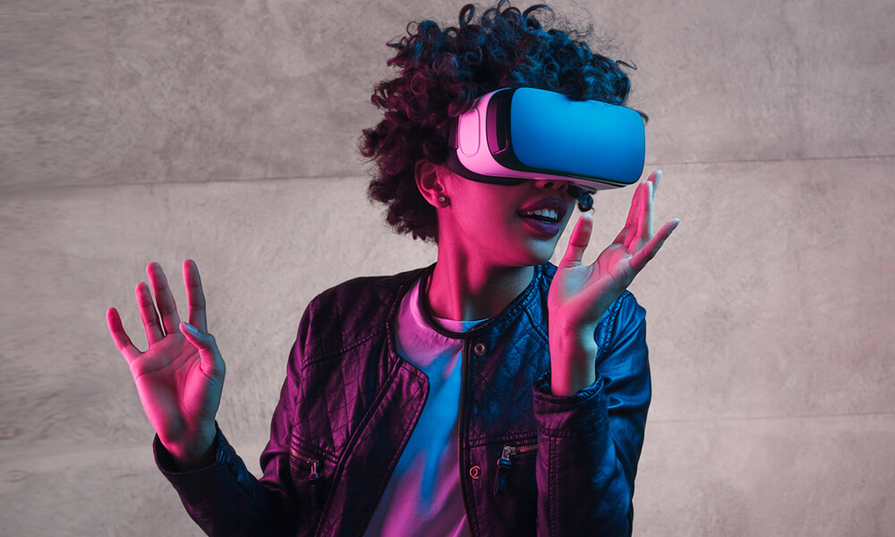 Teenager girl wearing virtual reality headset.