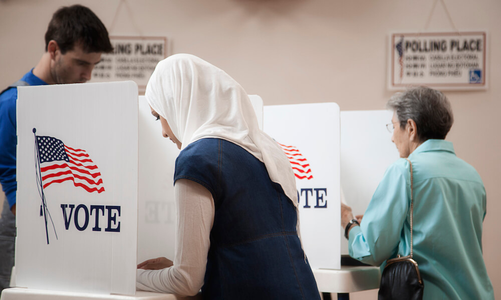 Voters voting in polling place