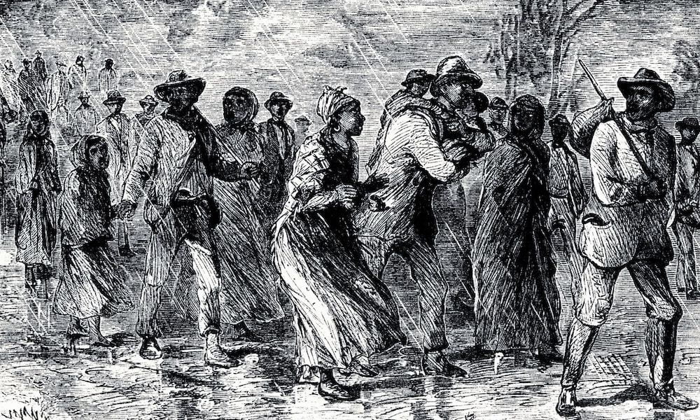 Enslaved people escaping on the Underground Railroad