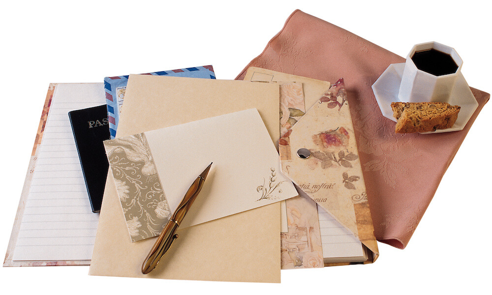 papers, envelopes, stationary on a desk