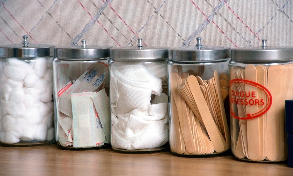Row of medical supplies in canisters