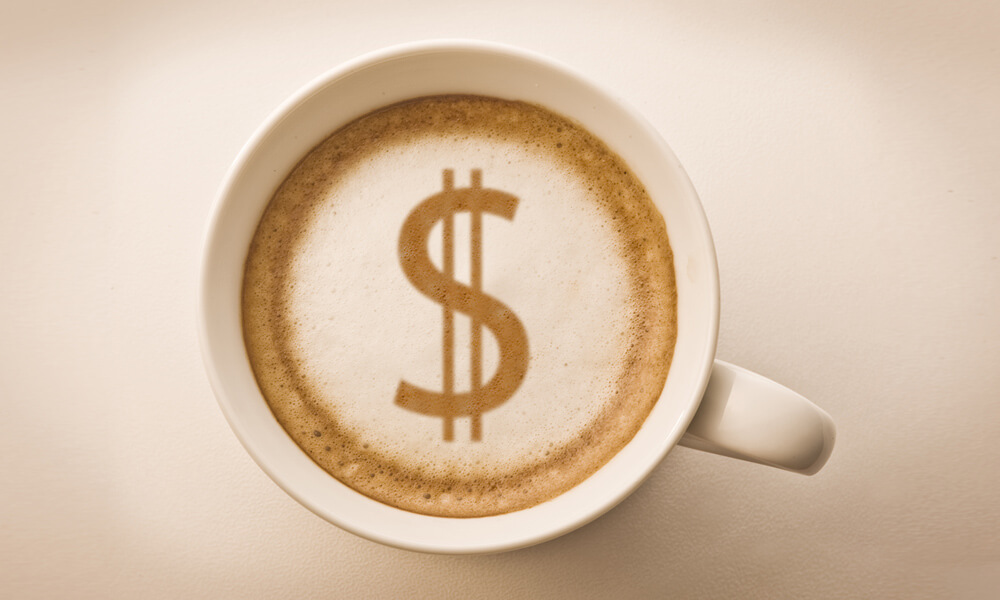 Expensive specialty coffee: Dollar sign drawing on a latte coffee cup