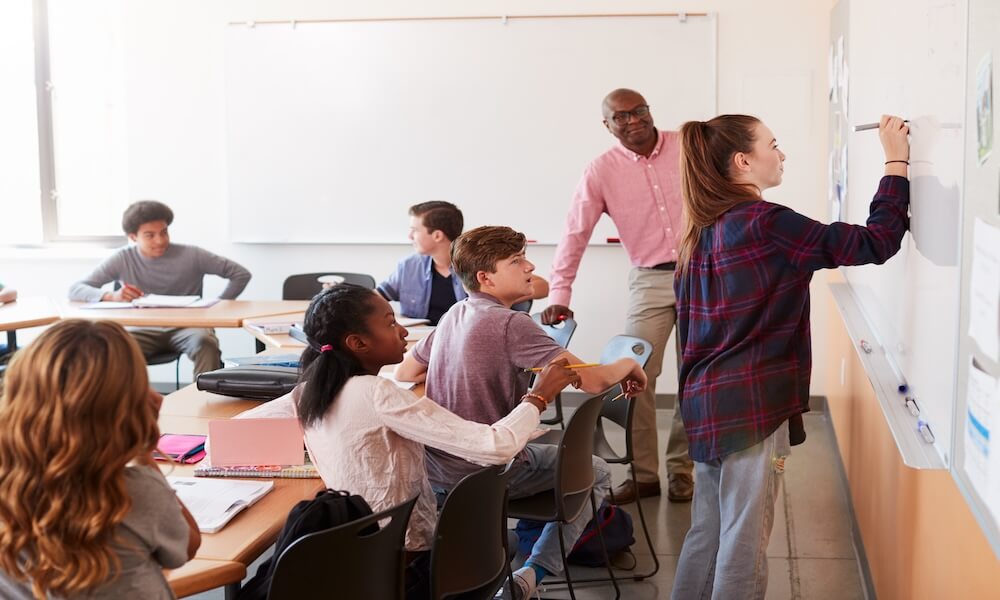 High school tutor teaching class