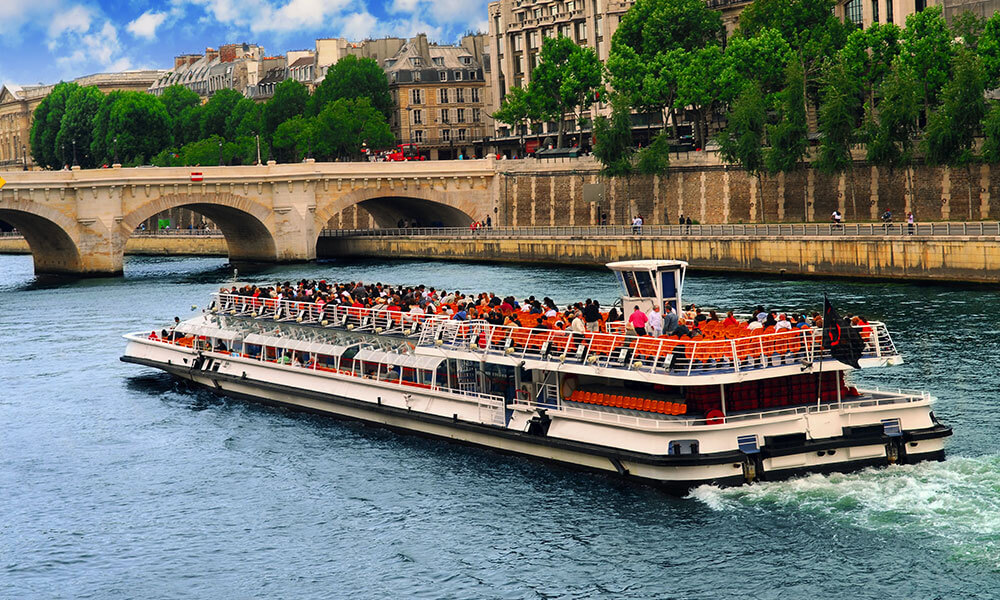 Boat tour on Seine river in Paris, France