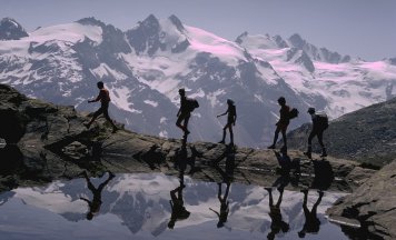 People Hiking in the Alps
