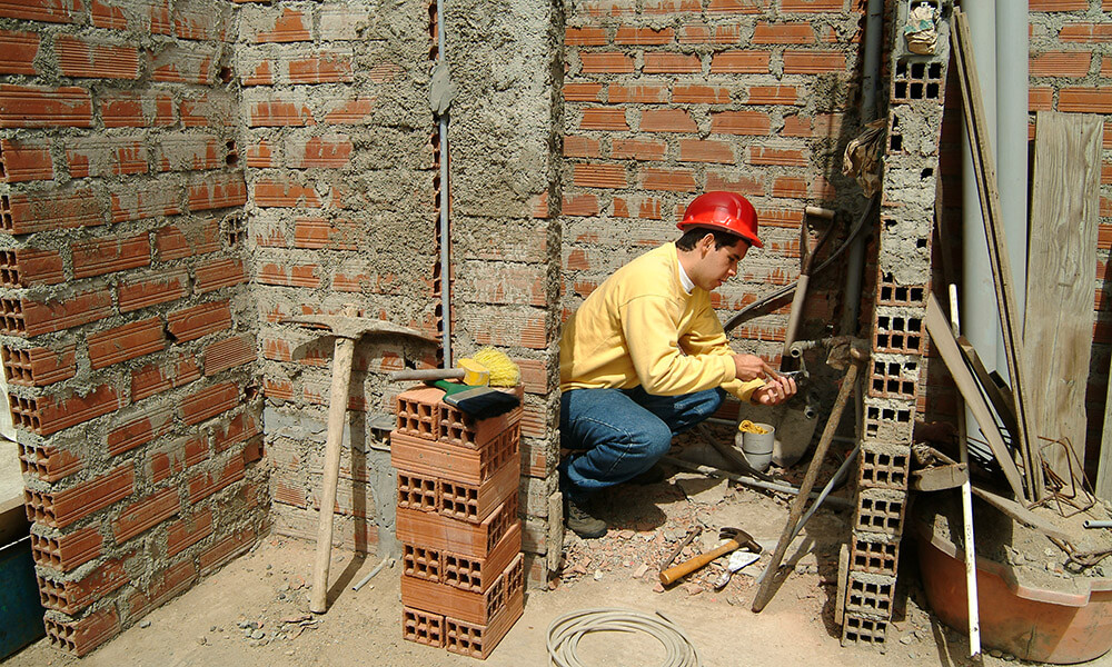 Teen boy on construction site