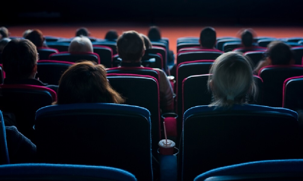 Viewers watching movie in theater