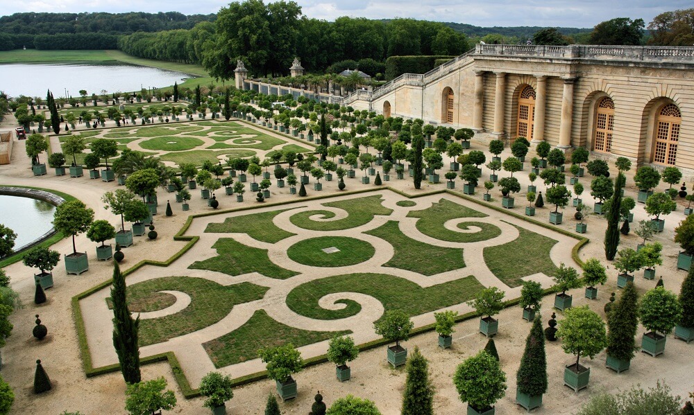Versailles - beautiful ornamental gardens and French chateau. National landmark of France.