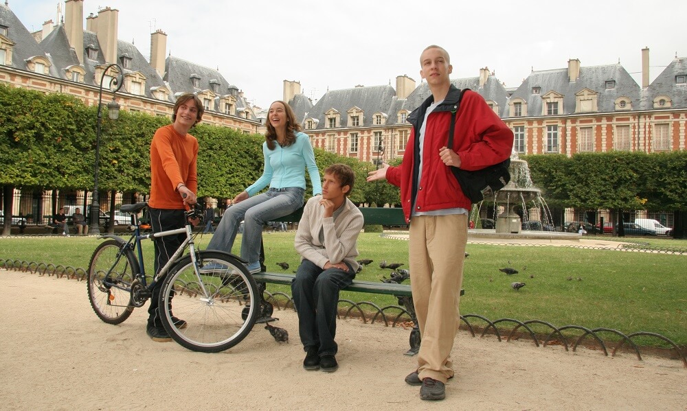 Group of friends in Luxembourg Gardens, Paris, France