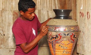 Teen artisan working on pottery in Costa Rica
